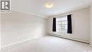 312 1510 Neville Drive, Regina, SK  - Indoor Photo Showing Other Room 