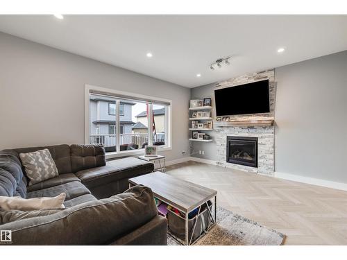 3901 44 Av, Beaumont, AB - Indoor Photo Showing Living Room With Fireplace
