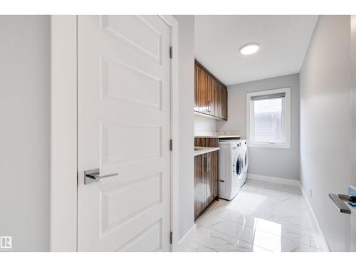 3901 44 Av, Beaumont, AB - Indoor Photo Showing Laundry Room