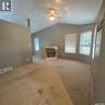8 Coupland Crescent, Meadow Lake, SK  - Indoor Photo Showing Other Room With Fireplace 