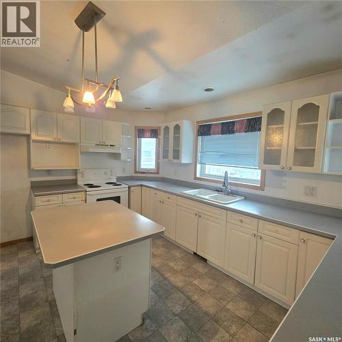 8 Coupland Crescent, Meadow Lake, SK - Indoor Photo Showing Kitchen With Double Sink