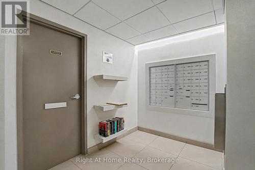 Lobby - Mailbox Area & Lending Library. - 603 - 2121 Lakeshore Road, Burlington (Brant), ON - Indoor Photo Showing Other Room