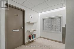 Lobby - Mailbox Area & Lending Library. - 