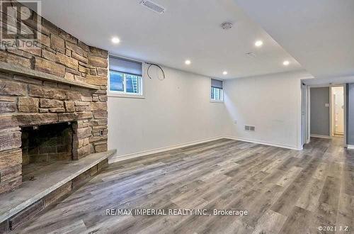 Lower - 711 Gilbert Street W, Whitby, ON - Indoor With Fireplace