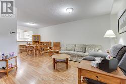 Living Room Open To Dining Room And Kitchen - 