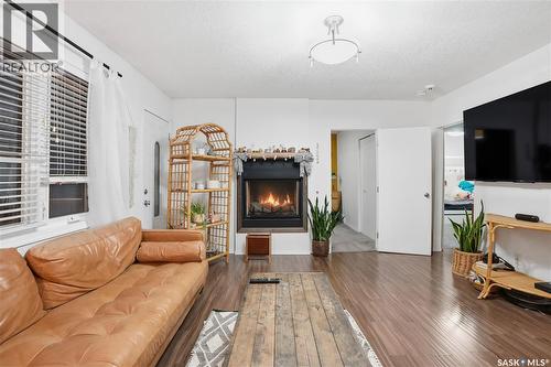 600 Mullin Avenue E, Regina, SK - Indoor Photo Showing Living Room With Fireplace
