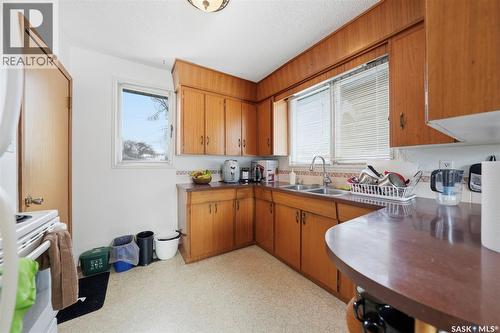 106 112Th Street W, Saskatoon, SK - Indoor Photo Showing Kitchen With Double Sink