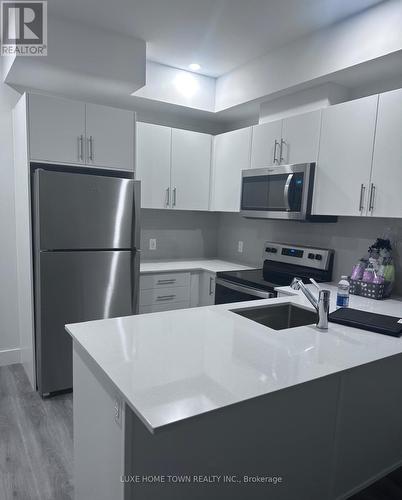 315 - 1000 Lackner Boulevard, Kitchener, ON - Indoor Photo Showing Kitchen With Upgraded Kitchen