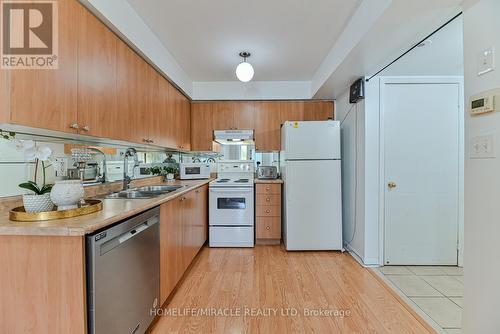 5 - 4620 Guildwood Way, Mississauga, ON - Indoor Photo Showing Kitchen With Double Sink