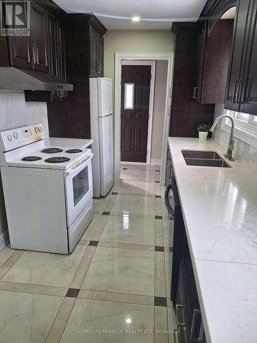 22 Graymar Road, Brampton, ON - Indoor Photo Showing Kitchen With Double Sink