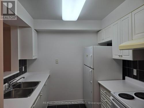 609 - 1883 Mcnicoll Avenue, Toronto, ON - Indoor Photo Showing Kitchen With Double Sink