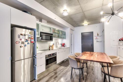 Salle à manger - 413-1340 Rue Olier, Montréal (Le Sud-Ouest), QC - Indoor Photo Showing Kitchen With Upgraded Kitchen
