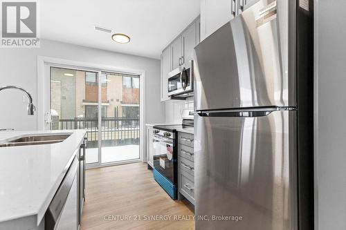 11 - 801 Glenroy Gilbert Drive, Ottawa, ON - Indoor Photo Showing Kitchen With Double Sink