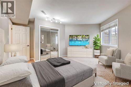 1520 Venetian Boulevard Unit# M108, Point Edward, ON - Indoor Photo Showing Bedroom