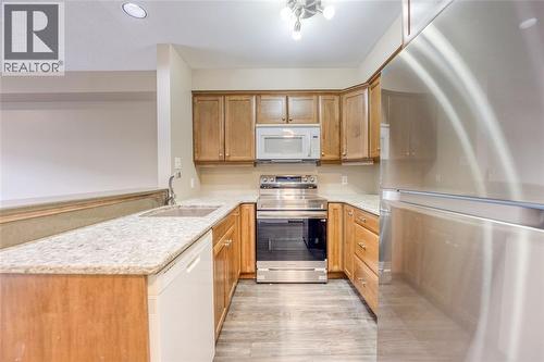 1520 Venetian Boulevard Unit# M108, Point Edward, ON - Indoor Photo Showing Kitchen