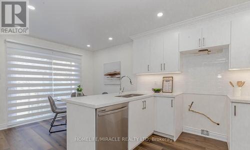 Upper - 44 Leatherhead Court, Brampton, ON - Indoor Photo Showing Kitchen With Double Sink