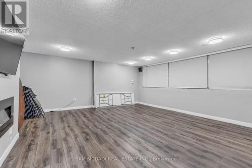 605 - 3590 Kaneff Crescent, Mississauga, ON - Indoor With Fireplace