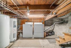 Shared laundry in lower level. - 