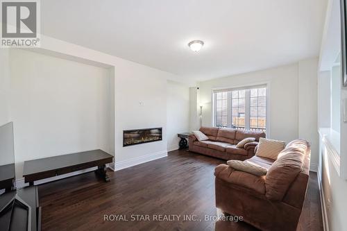 Upper - 1 Bushwood Trail, Brampton, ON - Indoor Photo Showing Living Room With Fireplace