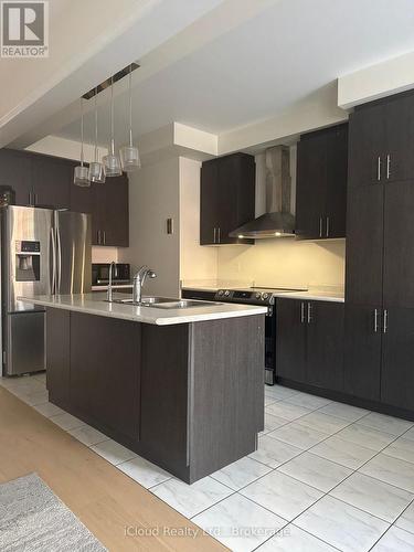 1443 Bews Landing, Milton, ON - Indoor Photo Showing Kitchen With Double Sink