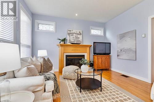764 Prince Of Wales Drive, Cobourg, ON - Indoor Photo Showing Living Room With Fireplace