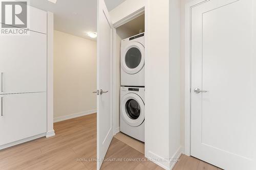 Washer and Dryer - 2006 - 28 Freeland Street, Toronto, ON - Indoor Photo Showing Laundry Room
