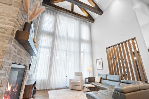 Salon - 650 Rue De Belle-Plagne, Saint-Sauveur, QC - Indoor Photo Showing Living Room With Fireplace