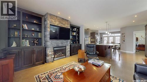 1646 Badham Boulevard, Regina, SK - Indoor Photo Showing Living Room With Fireplace