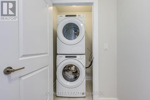 408 - 3200 William Coltson Avenue, Oakville, ON - Indoor Photo Showing Laundry Room