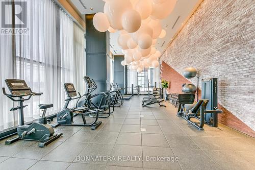 408 - 3200 William Coltson Avenue, Oakville, ON - Indoor Photo Showing Gym Room