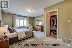 virtually staged & renovated primary bedroom - 