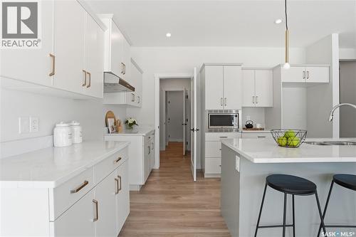338 Katz Avenue, Saskatoon, SK - Indoor Photo Showing Kitchen With Double Sink With Upgraded Kitchen