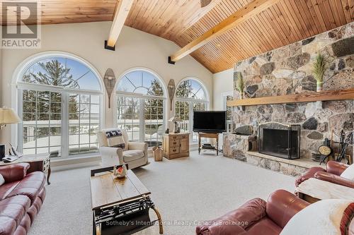 679 Sandy Bay Road, Tiny, ON - Indoor Photo Showing Living Room With Fireplace