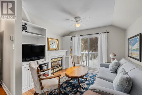 679 Sandy Bay Road, Tiny, ON - Indoor Photo Showing Living Room With Fireplace