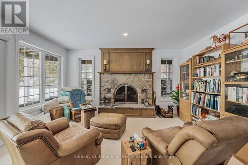 679 Sandy Bay Road, Tiny, ON - Indoor Photo Showing Living Room With Fireplace