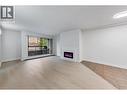115 8591 Westminster Highway, Richmond, BC  - Indoor Photo Showing Other Room With Fireplace 