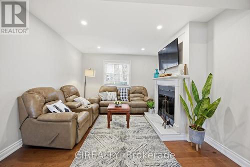 27 Pine Avenue S, Mississauga, ON - Indoor Photo Showing Living Room With Fireplace