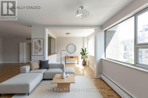 303 - 9 Deer Park Crescent, Toronto, ON - Indoor Photo Showing Living Room