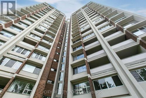 303 - 9 Deer Park Crescent, Toronto, ON - Outdoor With Facade