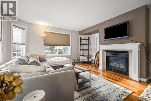 208 1638 6Th Avenue, Prince George, BC - Indoor Photo Showing Living Room With Fireplace