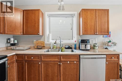 111 Dulmage Crescent, Saskatoon, SK - Indoor Photo Showing Kitchen With Double Sink