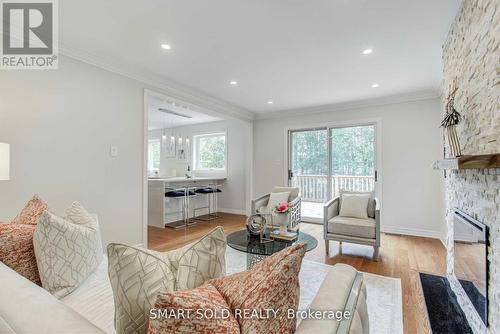 Upper Level - 45 Abbeywood Trail, Toronto, ON - Indoor Photo Showing Living Room