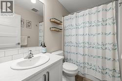 Suite Bathroom with vanity and shower / bath combo - 