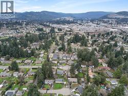 Aerial view of property's location featuring nearby suburban area - 