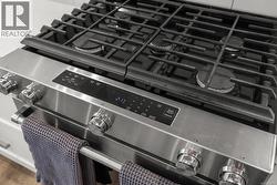 Kitchen view of gas range - 