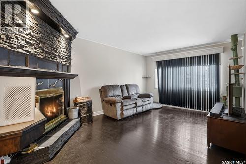409 Argyle Street N, Regina, SK - Indoor Photo Showing Living Room With Fireplace