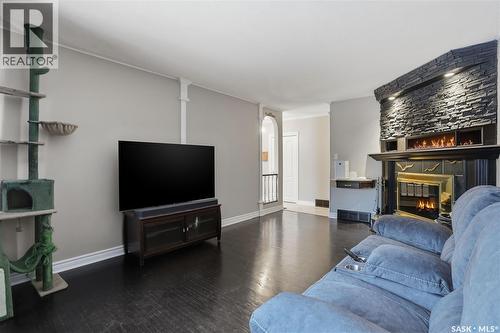 409 Argyle Street N, Regina, SK - Indoor Photo Showing Living Room With Fireplace