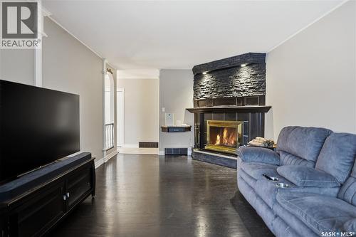 409 Argyle Street N, Regina, SK - Indoor Photo Showing Living Room With Fireplace