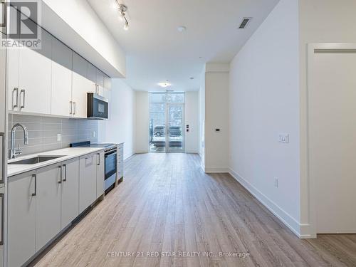 119 - 2075 King Road, King, ON - Indoor Photo Showing Kitchen With Upgraded Kitchen