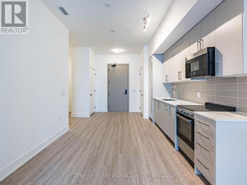 119 - 2075 King Road, King, ON - Indoor Photo Showing Kitchen